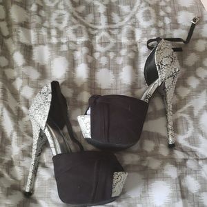 Black and white platform pumps